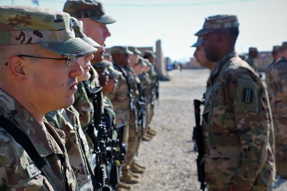 Task Force Cavalier is awarded the 329th Regional Support Group Shoulder Sleeve Insignia-Former Wartime Service, during Patch Ceremony