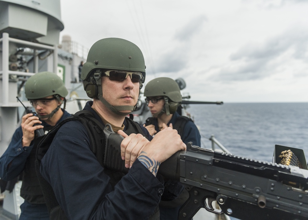 Sailors participate in a live fire exercise aboard USS Ashland (LSD 48)