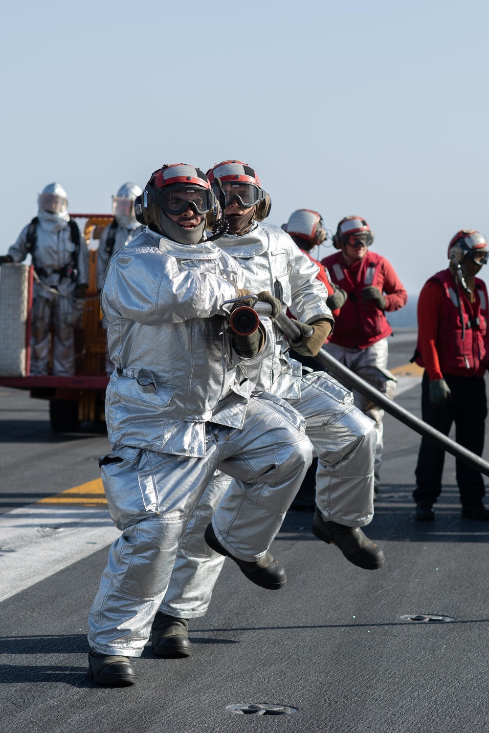 The aircraft carrier USS John. C. Stennis (CVN 74) conducts flight deck drills