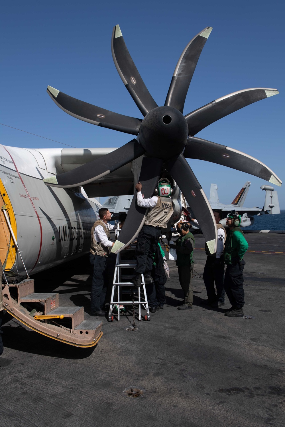 U.S. Sailors conduct corrosion control