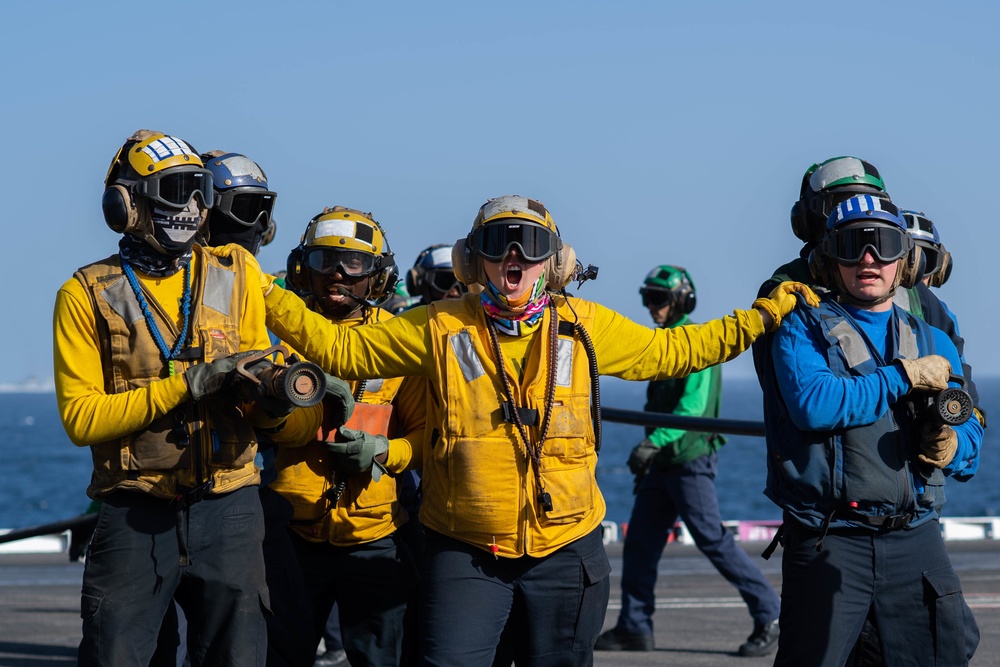 The aircraft carrier USS John. C. Stennis (CVN 74) conducts flight deck drills