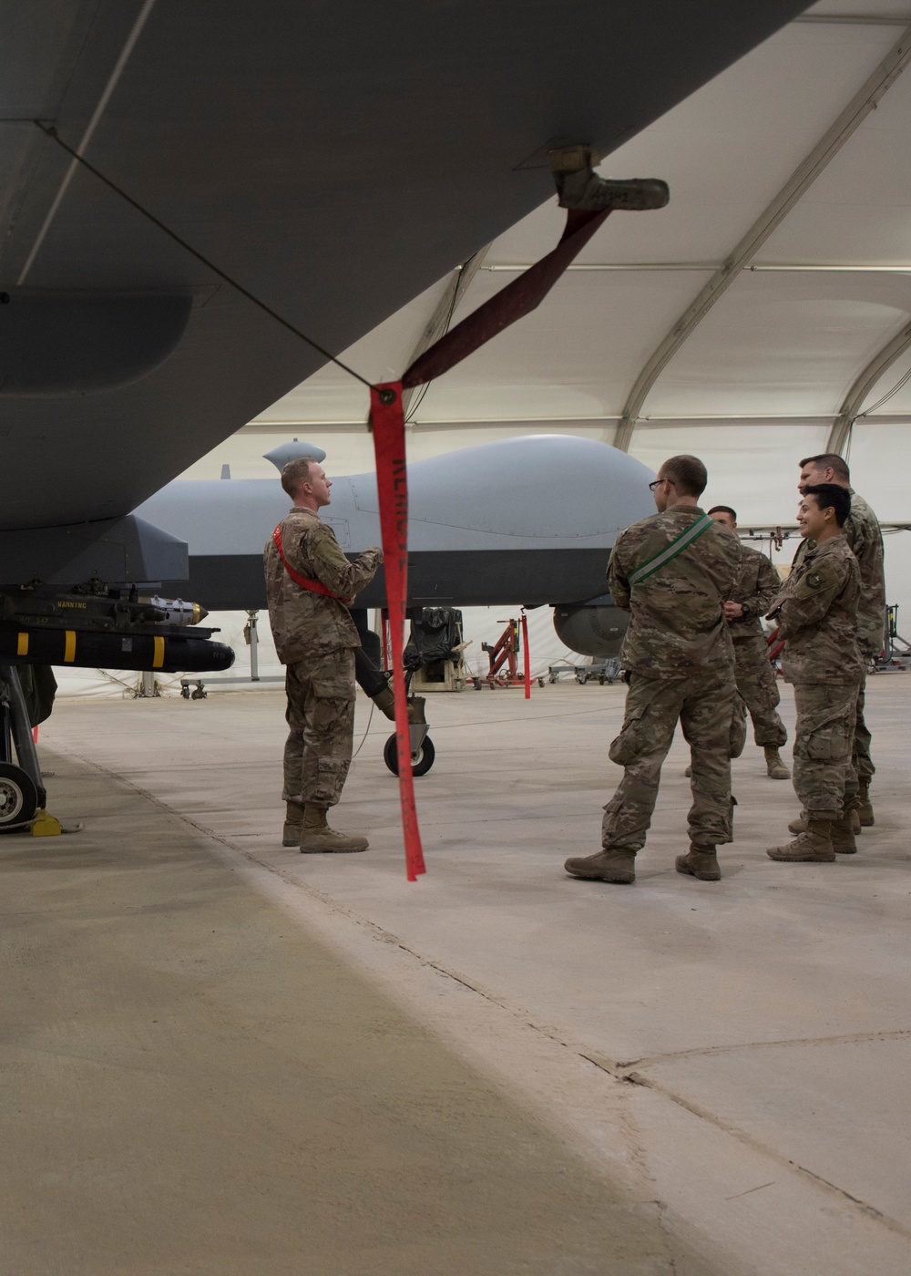 Service members learn about the Reapers
