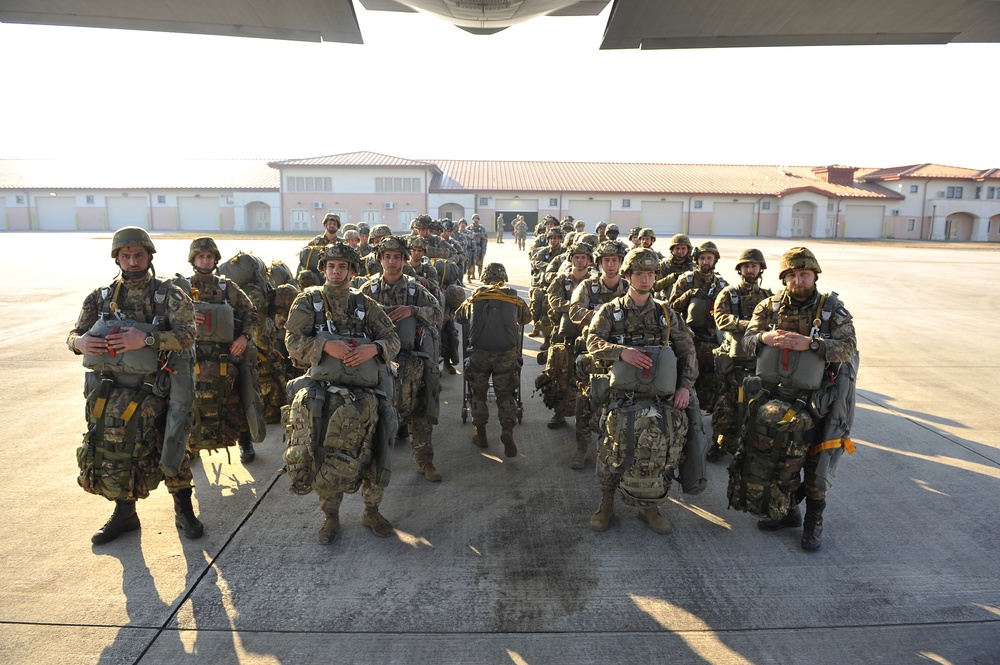 Paratroopers stand by to load aircraft.