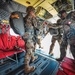 Paratroopers exit from CH-47 Chinook helicopter