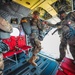 Paratroopers exit from CH-47 Chinook helicopter