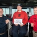 U.S. Sailors pose for a photo