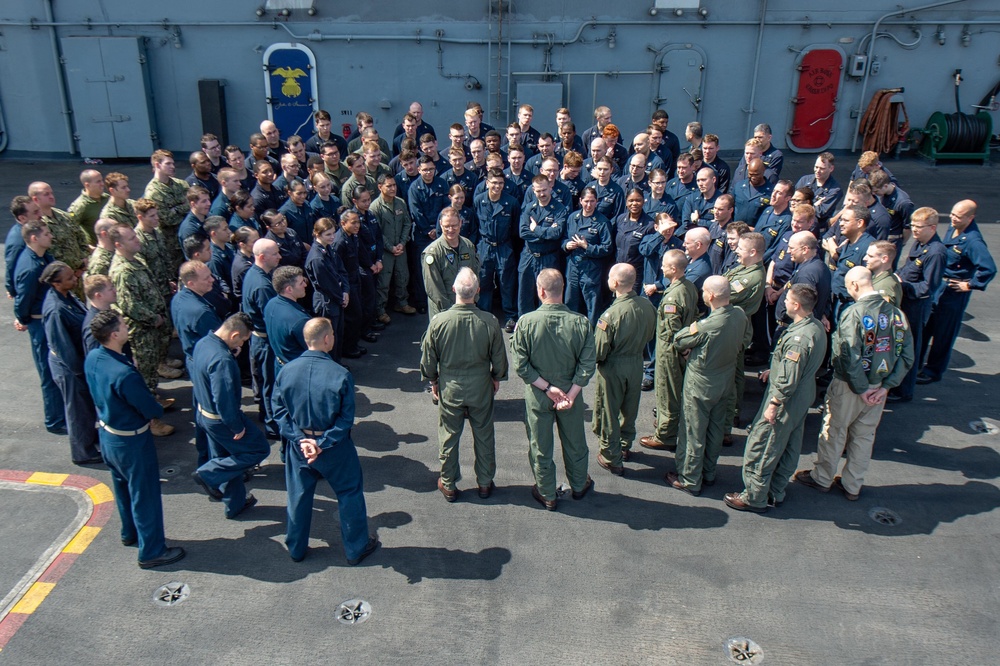 U.S.  Navy Rear Adm. addresses U.S. Sailors