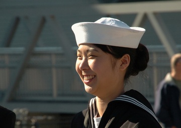A portrait of a re-enlistment aboard a Battleship