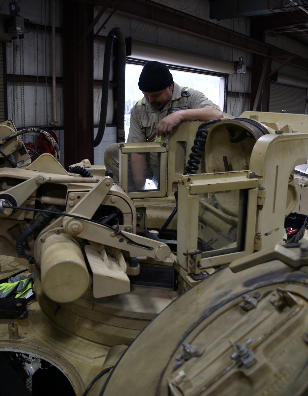 Soldiers, contractors perform maintenance on 4-118th CAB equipment in preparation for deployment