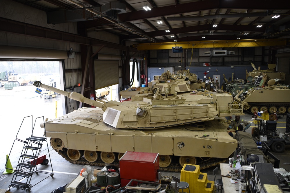 Soldiers, contractors perform maintenance on 4-118th CAB equipment in preparation for deployment