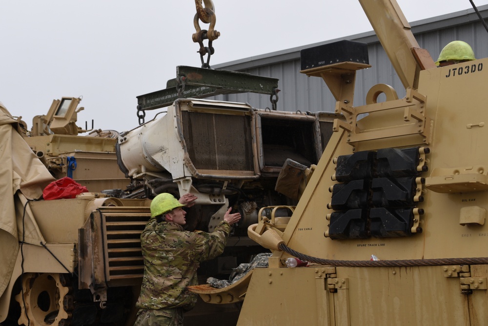 Soldiers, contractors perform maintenance on 4-118th CAB equipment in preparation for deployment