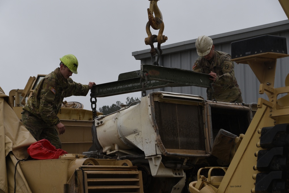 Soldiers, contractors perform maintenance on 4-118th CAB equipment in preparation for deployment