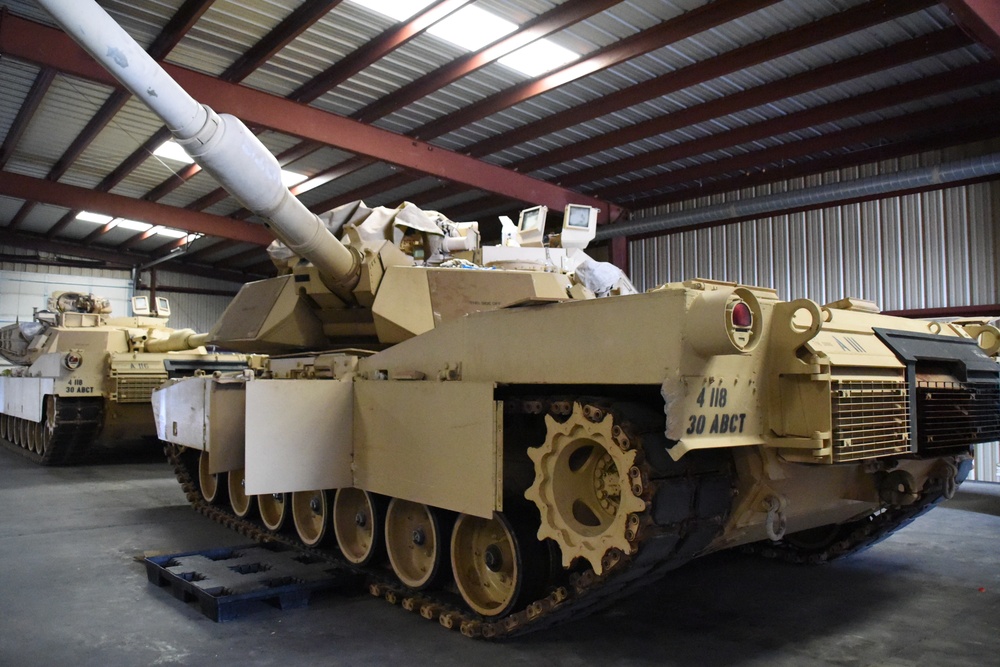 Soldiers, contractors perform maintenance on 4-118th CAB equipment in preparation for deployment