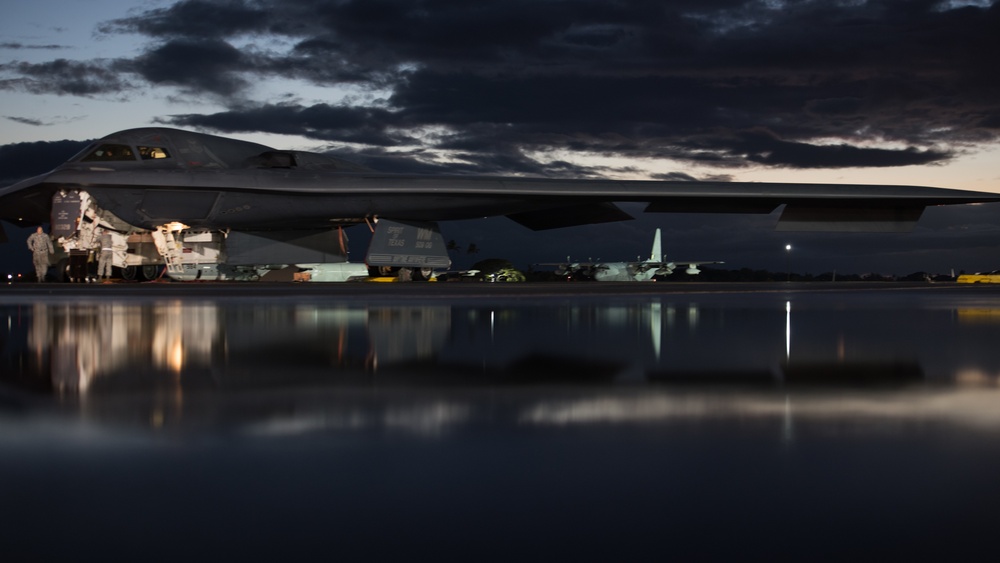 A B-2 Bomber is prepped to be armed with inert munitions