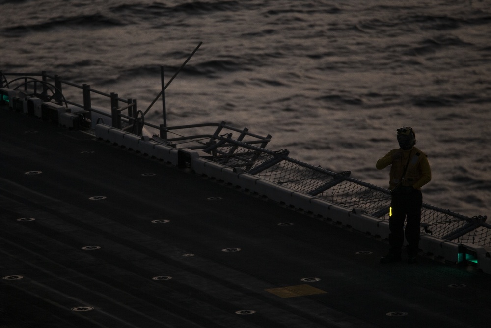 VMM-262 naval aviators complete flight operations at sunset aboard Wasp