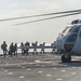 Marines board a CH-53E Super Stallion aboard USS Ashland (LSD 48)