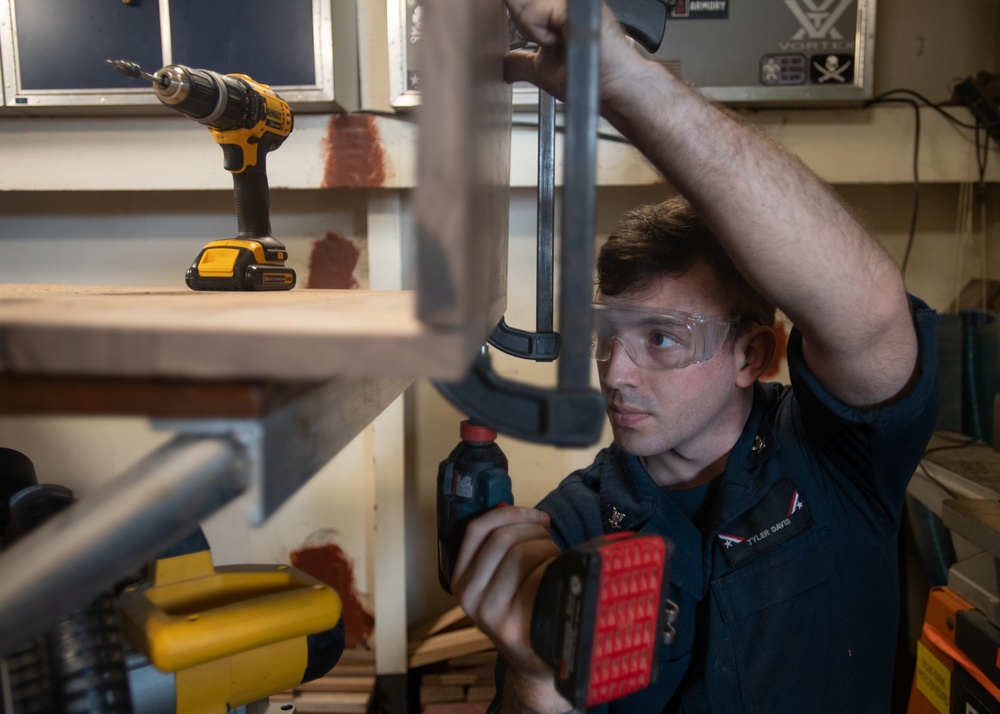 U.S. Sailor builds a cabinet