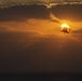 VMFA-121 naval aviators conduct flight operations at sunset aboard Wasp