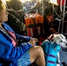 Coast Guard rescues woman, dog  1 mile west of North Cat Cay, Bahamas