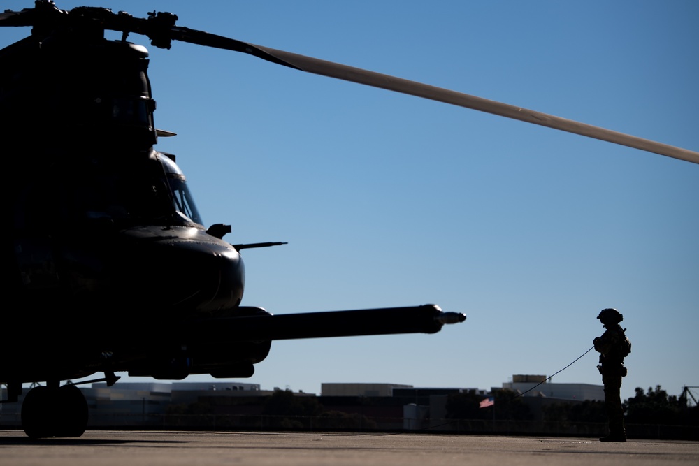 Army MH-47 Chinook launches from Naval Air Station North Island