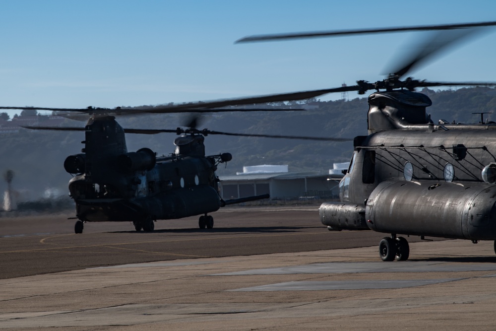 Army MH-47 Chinook launches from Naval Air Station North Island