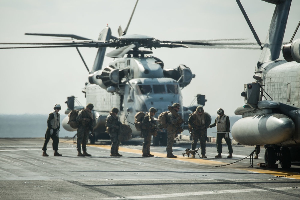 ’China Marines’ of BLT 1/4, 31st MEU, strap in for a simulated raid in the East China Sea