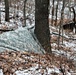 Cold-Weather Operations Course students build improvised shelters, survive outdoors