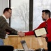 Greg Kiaer, Civil Engineer, receives Certificate of Achievement for presentation