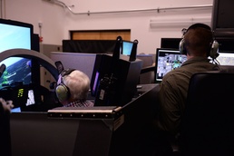 Retired pilot, Columbus native climbs back into T-38 sim one more time