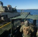 Marines use bridging techniques to move tanks across 2 miles of open water