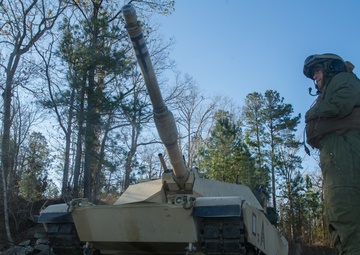 Marines use bridging techniques to move tanks across 2 miles of open water