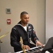 Musician Second Class Brian Mathis performs for the reception celebrating Australia Day and General MacArthur's Birthday