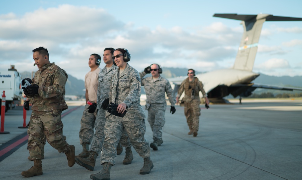 Air Force Reserve Airmen Load Cargo on C-5M
