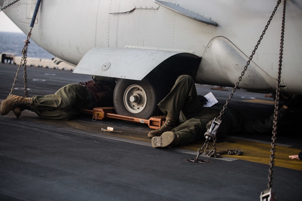 VMFA-121 Marines load inert ordnance onto F-35Bs aboard Wasp