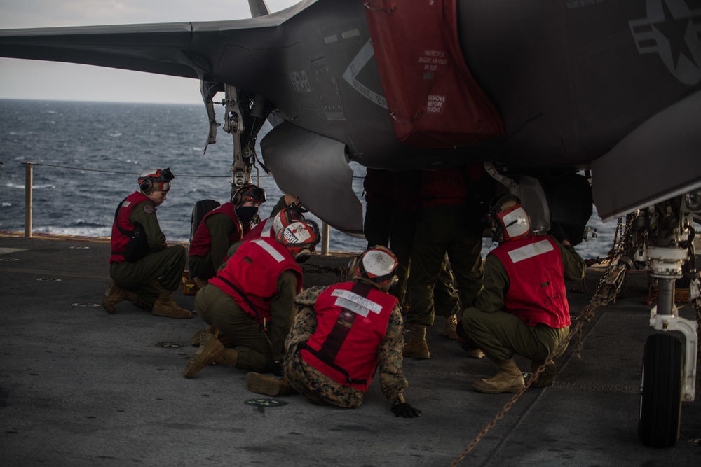 VMM-262 (REIN) Marines load inert ordnance onto F-35Bs aboard Wasp