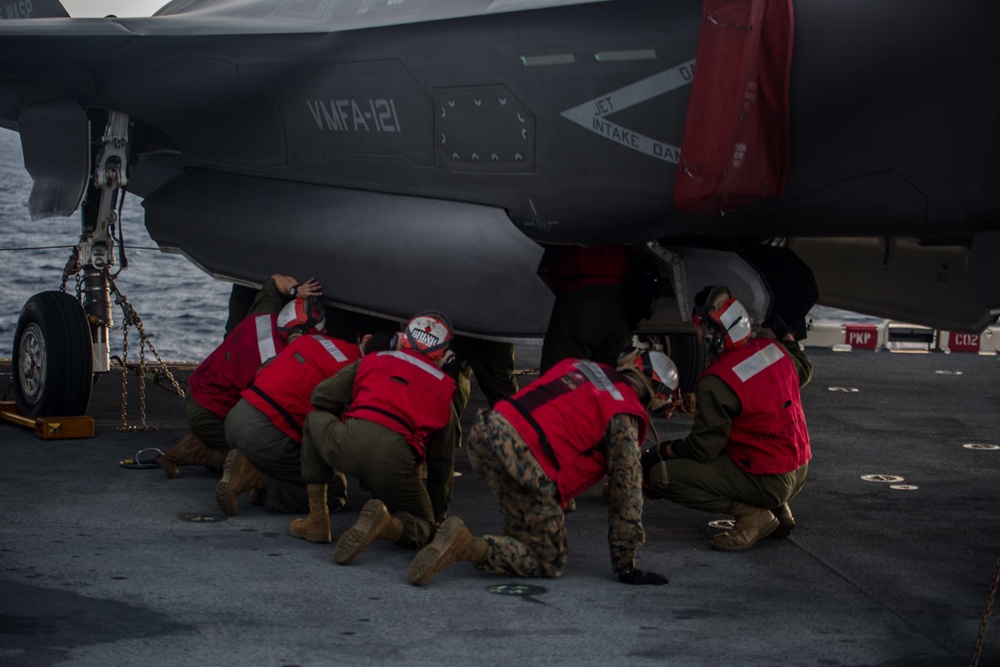 VMM-262 (REIN) Marines load inert ordnance onto F-35Bs aboard Wasp