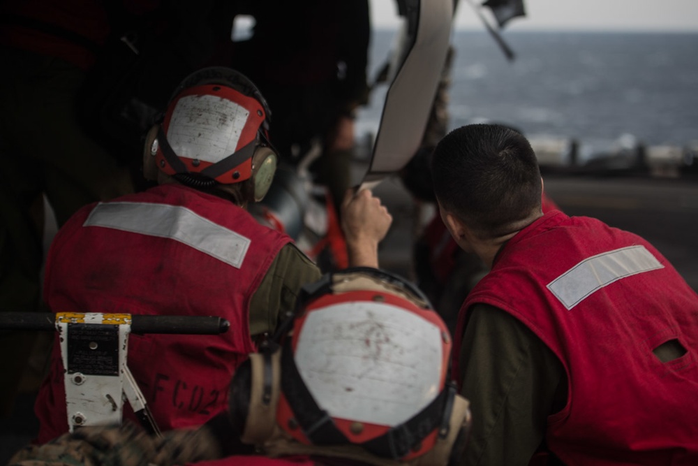 VMM-262 (REIN) Marines load inert ordnance onto F-35Bs aboard Wasp