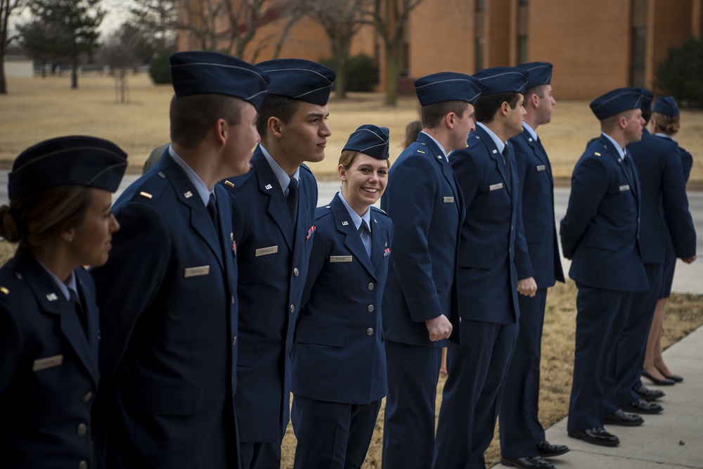 Student pilots stands along side her fellow classmates