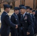 Lt. Gen. James C. Vechery shakes hands with new pilot