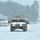 Vehicle training ops in January snow at Fort McCoy