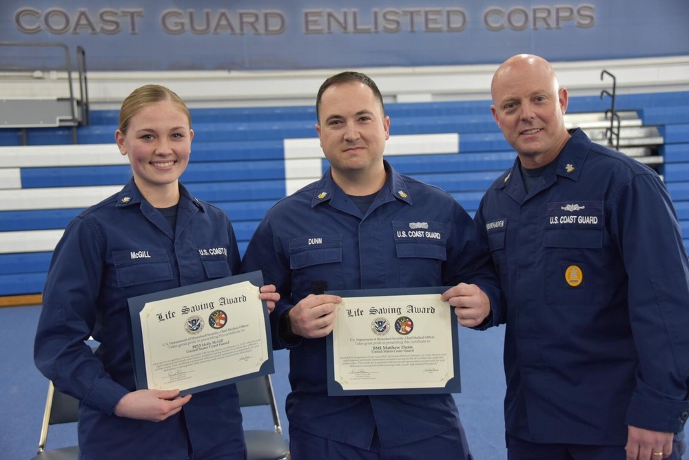 Coast Guard members receive DHS Life Saving Award by Master Chief Petty Officer of the Coast Guard