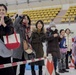 Family cheers the players during the Misawa Children's Ice Hockey Competition