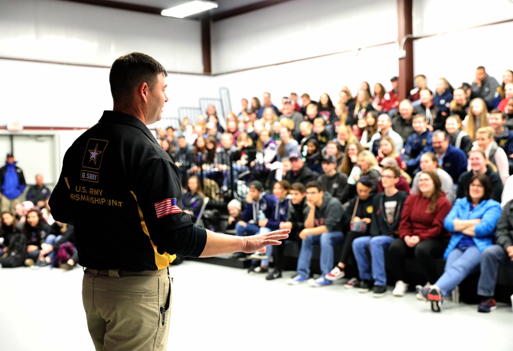 Two-time Olympic competitor gives junior marksmen tips on competing
