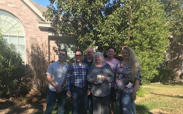 Retired Col. Martin Richard and his son Rylan pose with the family of Captain Paul L. Utz