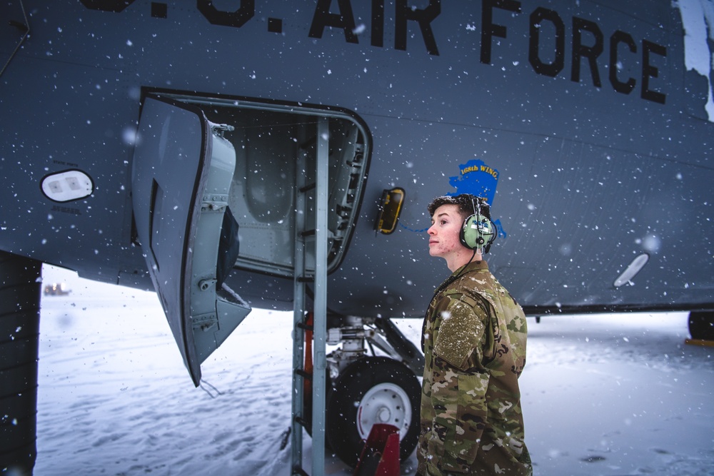 A KC-135 Stratotanker crew chief prepares his aircraft