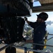 Coast Guard electronics technicians repair critical equipment aboard National Security Cutter while 147’ feet above sea level