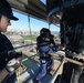 Coast Guard electronics technicians repair critical equipment aboard National Security Cutter while 147’ feet above sea level