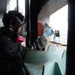 U.S. Sailor paints an angle iron