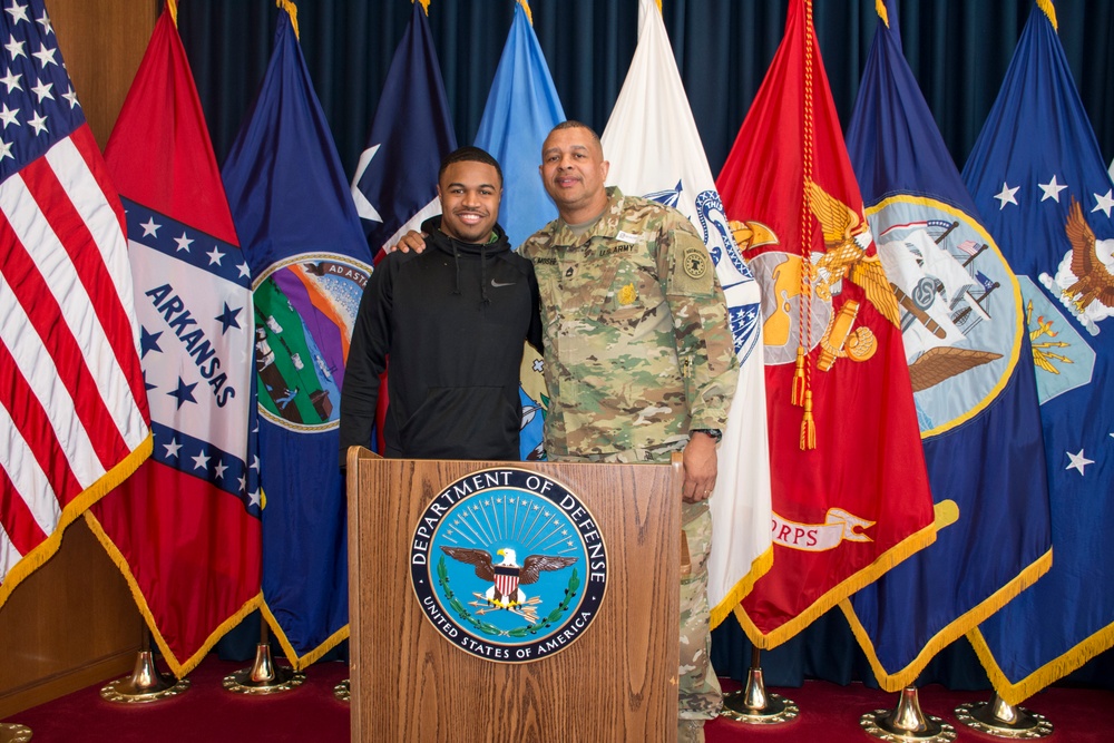 Father and Son Share in Army Traditions