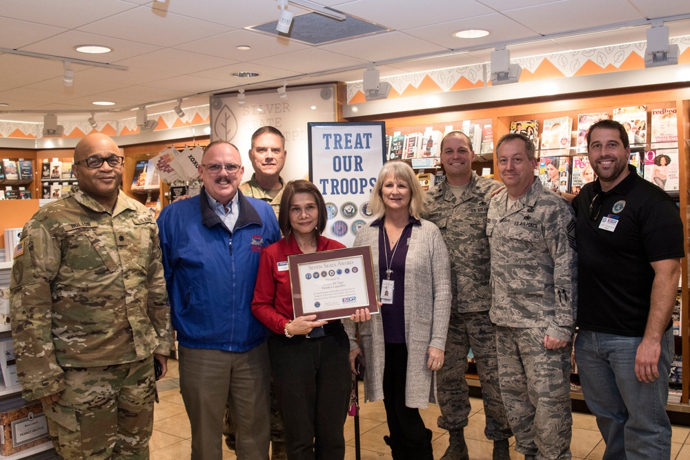 Employer Support of Guard and Reserve and National Guard Employment Support Program present Seven Seals Award to Leonor De Vega